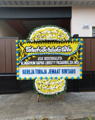Papan Bunga Duka di Cikampek